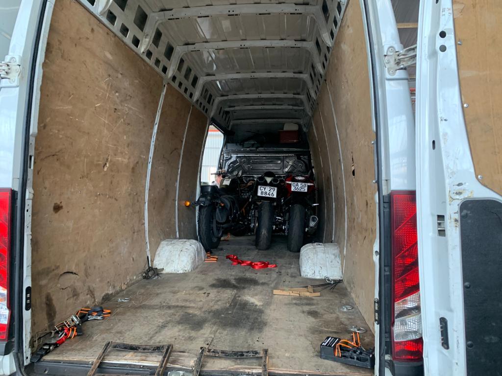Motorcycle being loaded for transport across South Africa